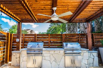 Outdoor patio with grilling stations